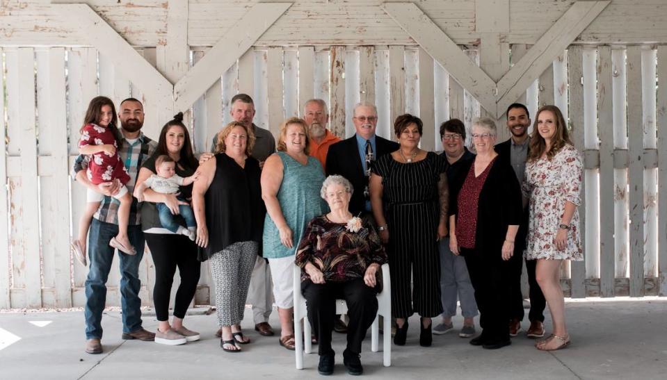 Betty Johnson, center, with loved ones during her 90th birthday celebration in September 2019.