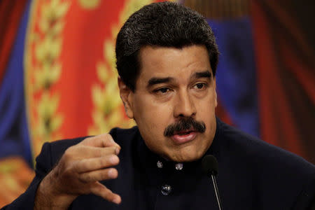 Venezuela's President Nicolas Maduro talks to the media during a news conference at Miraflores Palace in Caracas, Venezuela August 22, 2017. REUTERS/Marco Bello