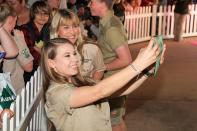 The 19-year-old cut her 'Dancing With The Stars' themed birthday cake before feeding the crocs, as you do.