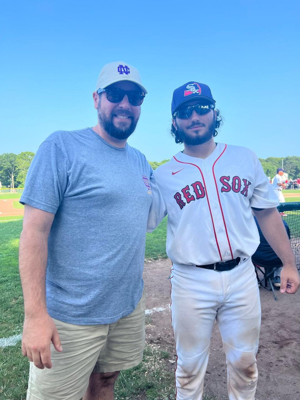 Clarkstown North baseball coach Joe Stefania (left) poses for a photo with Will King (right) after a game at the Cape Cod Summer Baseball League earlier this month.