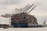 Tugboats escort the cargo ship Dali after it was refloated in Baltimore, Monday, May 20, 2024. The vessel on March 26 struck the Francis Scott Key Bridge causing it to collapse and resulting in the death of six people. (AP Photo/Matt Rourke)