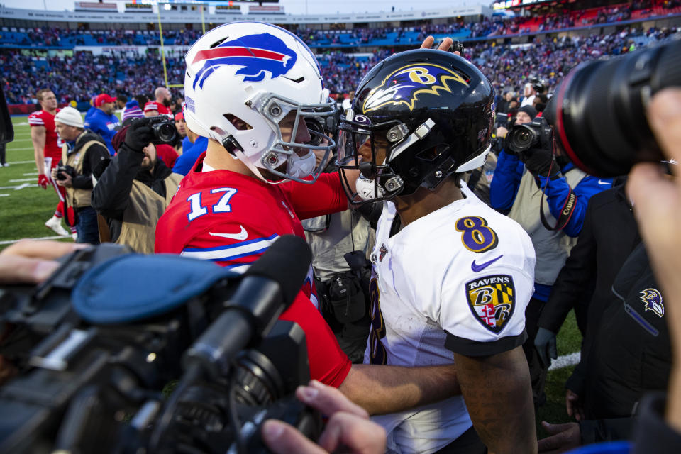 Josh Allen of the Buffalo Bills and Lamar Jackson of the Baltimore Ravens meet up in a great playoff matchup on Saturday night. (Photo by Brett Carlsen/Getty Images)