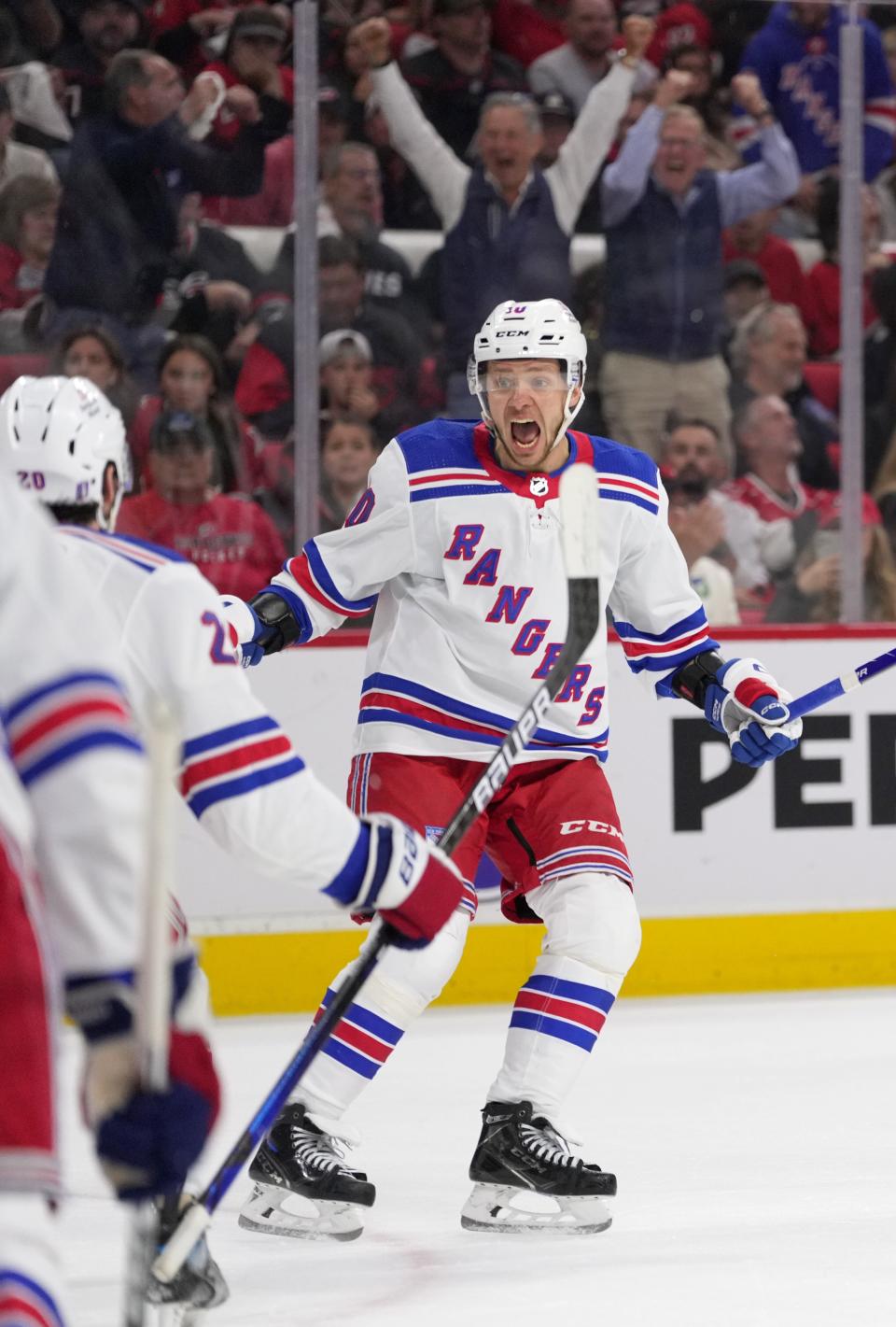 Artemi Panarin #10 of the New York Rangers celebrates a Chris Kreider #20 goal against the Carolina Hurricanes during the third period in Game Six of the Second Round of the 2024 Stanley Cup Playoffs at PNC Arena on May 16, 2024 in Raleigh, North Carolina.