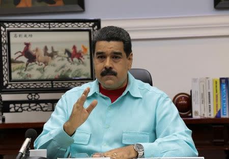 Venezuela's President Nicolas Maduro speaks during a meeting with ministers at Miraflores Palace in Caracas, Venezuela August 31, 2016. Miraflores Palace/Handout via REUTERS