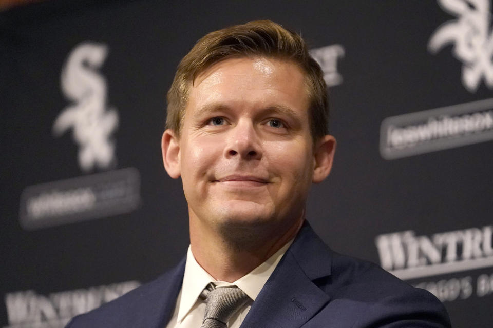Chris Getz, newly named senior vice president/general manager of the Chicago White Sox, smiles as he listens to a question during a baseball news conference Thursday, Aug. 31, 2023, in Chicago. Getz, a former player and front office executive with the Kansas City Royals and the White Sox, is in his seventh season with the Sox baseball operations department, including the last three as assistant general manager. (AP Photo/Charles Rex Arbogast)
