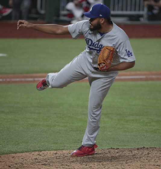 Dodgers reliever Kenley Jansen pitches the sixth inning of Game 3 of the NLCS at Globe Life Field.