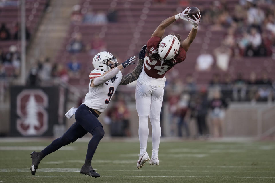 Stanford wide receiver Tiger Bachmeier, right, catches a pass while defended by Arizona safety Gunner Maldonado during the second half of an NCAA college football game Saturday, Sept. 23, 2023, in Stanford, Calif. (AP Photo/Godofredo A. Vásquez)