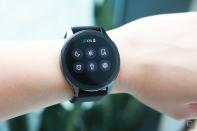 <p>OnePlus Watch review photos. OnePlus Watch on a wrist showing quick settings panel with icons for do not disturb, find my phone, alarms, flashlight, settings and brightness, as well as a battery indicator showing 43 percent.</p> 