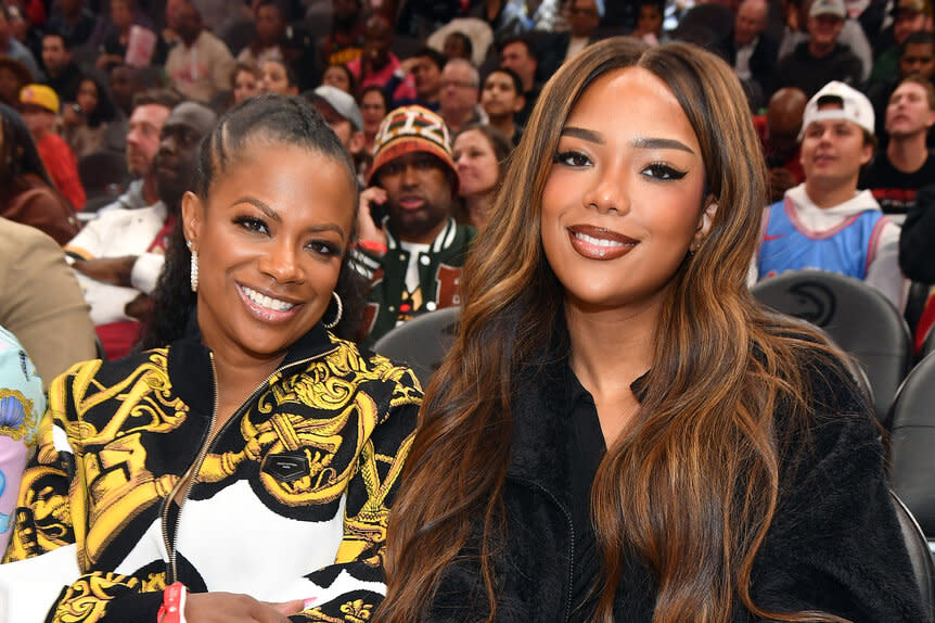 Kandi Burruss and her daughter, Riley Burruss, at a Miami Heat and Atlanta Hawks game at State Farm Arena.