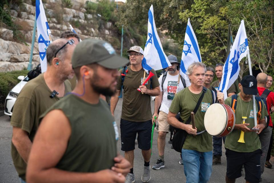 In August 2023, Brothers in Arms, an Israeli reservists organization, demonstrated against proposed judicial reforms in Israel. <a href="https://www.gettyimages.com/detail/news-photo/protesters-chant-slogans-during-a-demonstration-brothers-in-news-photo/1624825005" rel="nofollow noopener" target="_blank" data-ylk="slk:Matan Golan/SOPA Images/LightRocket via Getty Images;elm:context_link;itc:0;sec:content-canvas" class="link ">Matan Golan/SOPA Images/LightRocket via Getty Images</a>