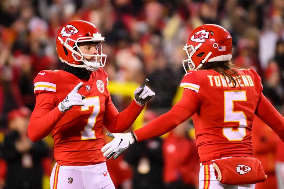 Kansas City Chiefs place kicker Harrison Butker (7) celebrates a 50-yard field goal with holder Tommy Townsend (5) against the Jacksonville Jaguars during the second half of an NFL divisional round playoff football game, Saturday, Jan. 21, 2023 in Kansas City, Mo.