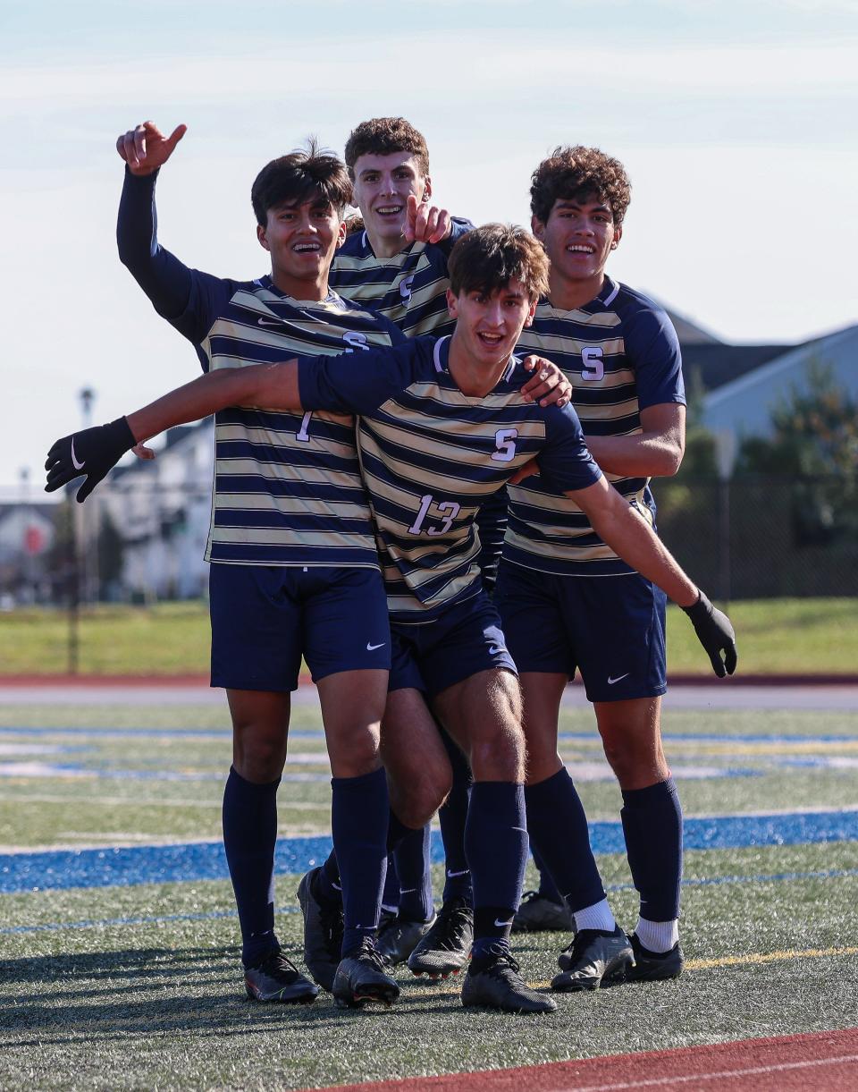 Salesianum players celebrate an early goal by Jake Ross during the Sals’ 4-1 win over Charter School of Wilmington in the DIAA Division I Boys Soccer championship game Saturday, November 19, 2022 at Dover High School.