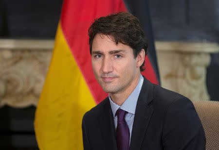 Canada's Prime Minister Justin Trudeau listens to German Economy Minister Sigmar Gabriel (unseen) prior to a bilateral meeting in Montreal, Canada, September 15, 2016. REUTERS/Christinne Muschi/File Photo