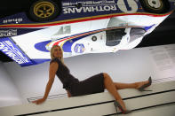 STUTTGART, GERMANY - APRIL 22: Tennis player Maria Sharapova poses next to a Porsche 956 C race car after at the Porsche Museum on April 22, 2013 in Stuttgart, Germany. (Photo by Alexander Hassenstein/Bongarts/Getty Images)