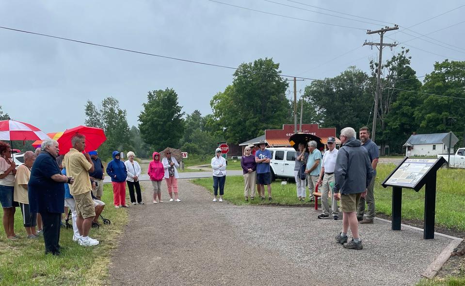 About 20 people, including officials from the Top of Michigan Trails Council, attended the July 20 dedication and ribbon cutting ceremony.