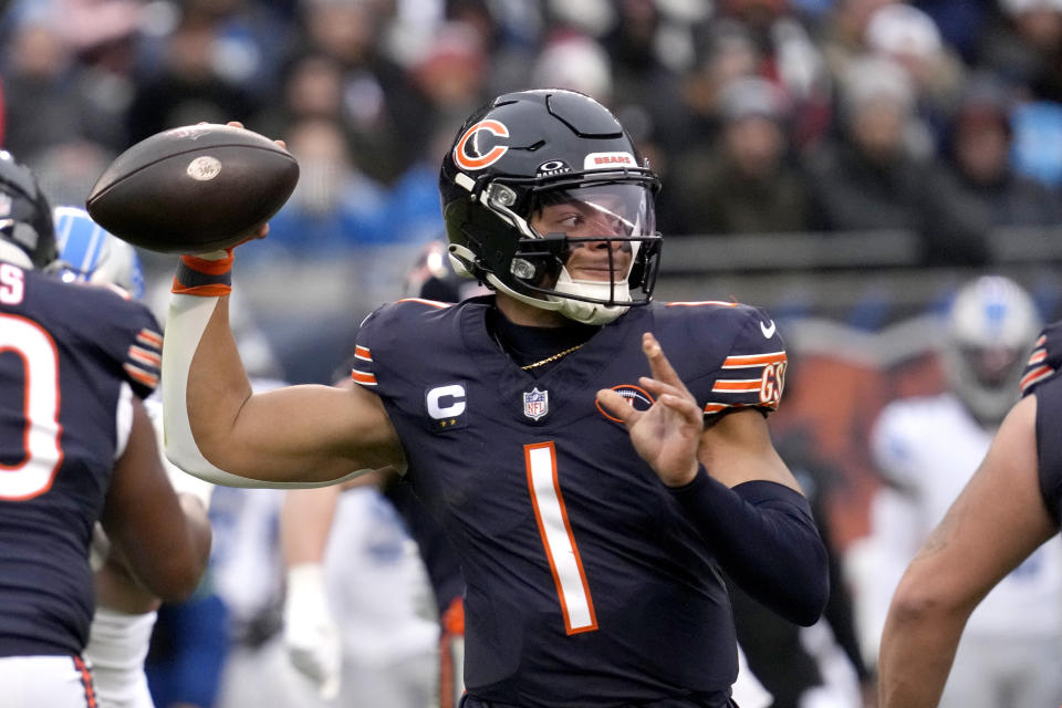 Chicago Bears quarterback Justin Fields passes during the first half of an NFL football game against the Detroit Lions Sunday, Dec. 10, 2023, in Chicago. (AP Photo/Nam Y. Huh)