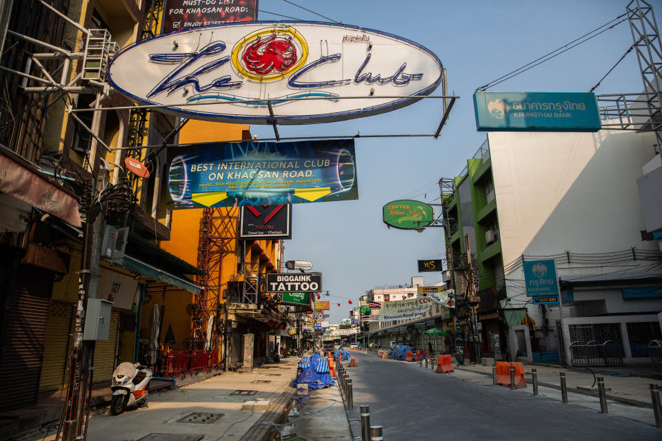 A view of empty streets, shuttered bars, and closed restaurants on Khaosan Road on April 15, 2020 in Bangkok. April 13-15 marks Songkran, Thailand's Buddhist new year celebration, when Thai people typically travel to the provinces to be with family or take part in large-scale water fights and parties throughout Bangkok.
