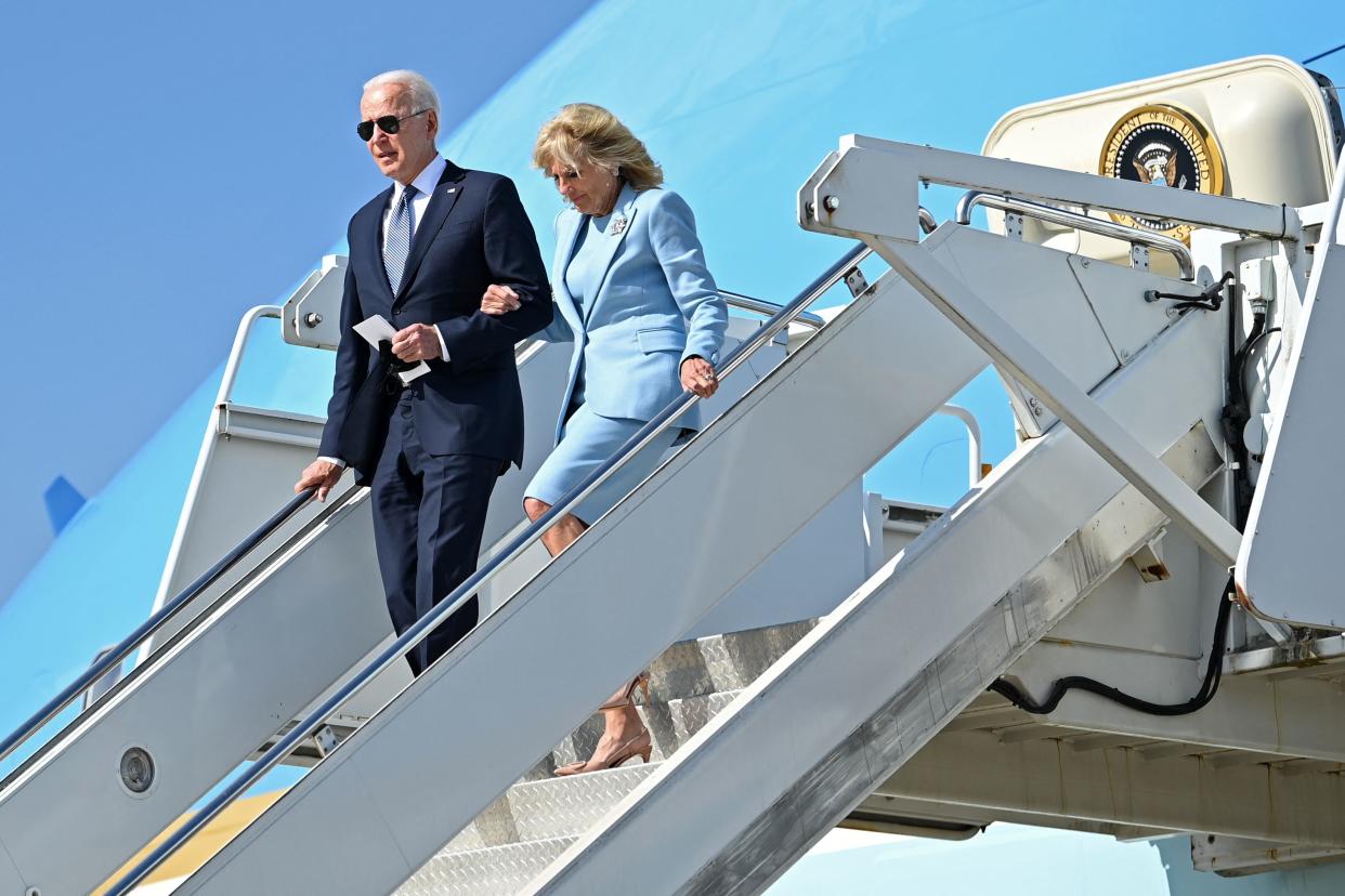 US President Joe Biden and US First Lady Jill Biden disembark from Airforce One at Heathrow, west of London, on June 13, 2021. - US president Biden will visit Windsor Castle late Sunday, where he and First Lady Jill Biden will take tea with the queen. (Photo by Brendan SMIALOWSKI / AFP) (Photo by BRENDAN SMIALOWSKI/AFP via Getty Images)