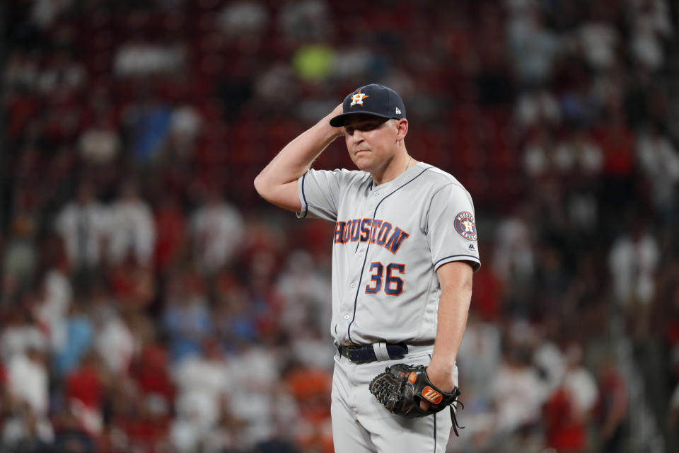 Houston Astros relief pitcher Will Harris pauses after giving up a solo home run to St. Louis Cardinals' Matt Wieters during the seventh inning of a baseball game Friday, July 26, 2019, in St. Louis. (AP Photo/Jeff Roberson)