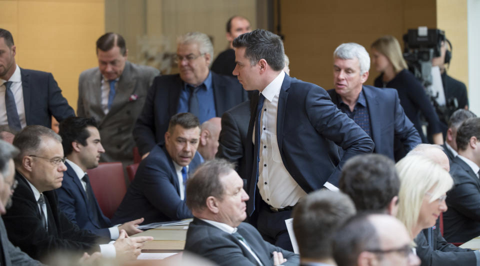 More than a dozen lawmakers from the far-right Alternative for Germany walked out of Bavarian state parliament during a tribute to Holocaust victims at the Bavarian Parliament in Munich, Germany, Wednesday, Jan. 23, 2019. (Peter Kneffel/dpa via AP)