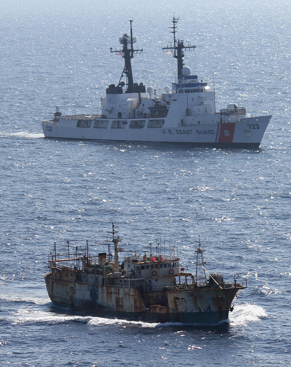 In this photo released by the U.S. Coast Guard, the crew of the Coast Guard cutter Rush escorts the suspected high seas drift net fishing vessel Da Cheng in the North Pacific Ocean Tuesday Aug. 14, 2012. The U.S. Coast Guard has transferred to China a vessel suspected of illegal high seas driftnet fishing that was pursued by a cutter assigned to Alaska. Coast Guard officials say the 177-foot Da Cheng seized 850 miles east of Tokyo last week was turned over Tuesday to the China Fishery Law Enforcement Command. The Hawaii-based Coast Guard cutter Rush escorted the stateless vessel. AP Photo/U.S. Coast Guard)