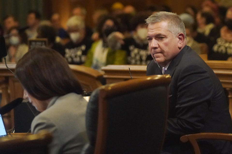 Supervisor Matt Dorsey, right, listens as Supervisor Catherine Stefani, left, speaks during a San Francisco Board of Supervisors meeting in San Francisco, Tuesday, Jan. 9, 2024. San Francisco supervisors approved a slimmed-down resolution calling for a cease-fire in Gaza that condemns Hamas. Three of 11 supervisors voted no, with two saying they could not support a resolution that does not explicitly call out the atrocities of the Oct. 7 attack by Hamas on Israel. (AP Photo/Jeff Chiu)