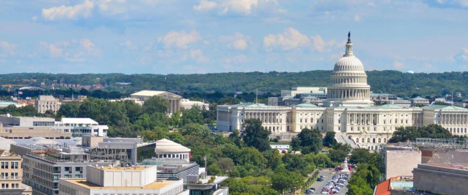 Washington DC - Aerial view of Pennsylvania street with federal buildings including US Archives building, Department of Justice and US Capitol