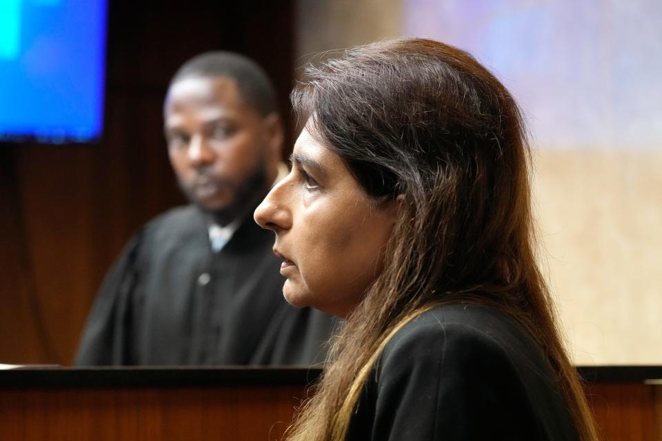 Dr. Fariha Qadir is questioned by Attorney Paulette Michel Loftin in court on Friday, July 28, 2023, in Pontiac, Mich. Prosecutors are making their case that the Michigan teenager, Ethan Crumbley, should be sentenced to life in prison for killing four students at his high school in 2021. Prosecutors introduced dark journal entries written by Crumbley, plus chilling video and testimony from a wounded staff member. (AP Photo/Carlos Osorio)