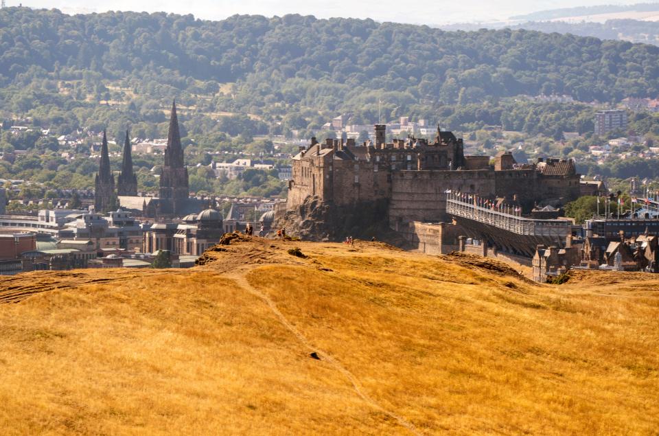 Large areas of grass have turned yellow due to the dry conditions in Holyrood Park, Edinburgh (Jane Barlow/PA Wire)