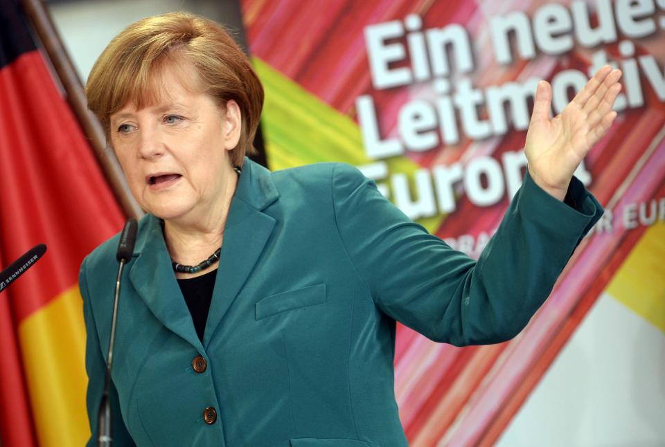 German Chancellor Angela Merkel speaks at the closing event of the campaign 'New Narrative for Europe' in the Academy of Arts in Berlin, Germany, Saturday March 1, 2014. (AP Photo/dpa, Britta Pedersen)