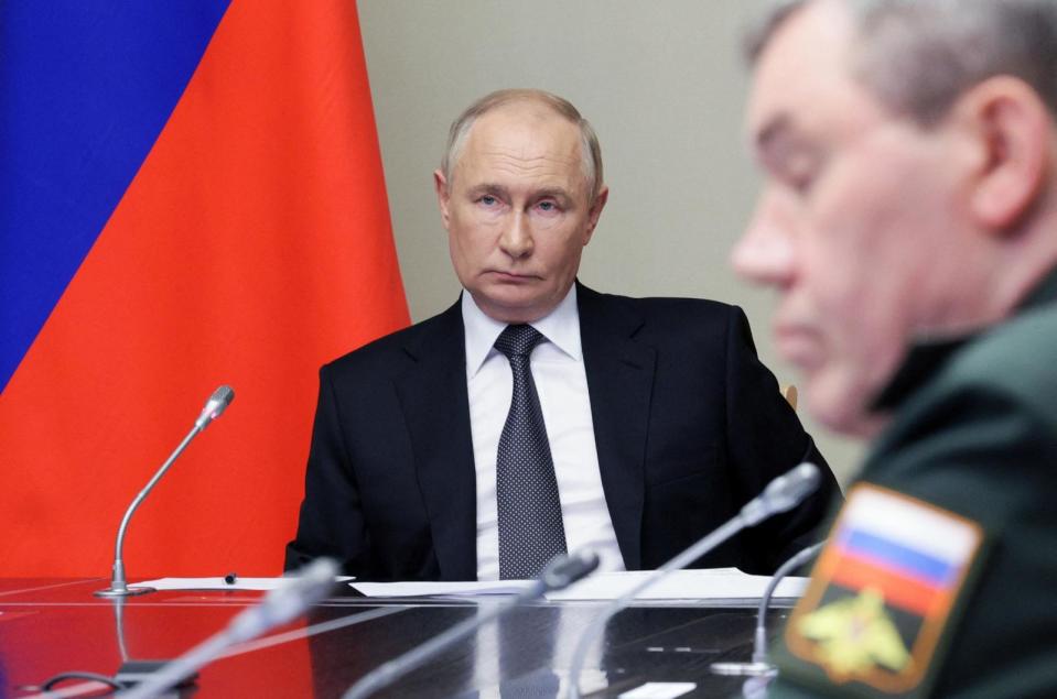 PHOTO:  In this pool photograph distributed by Russian state owned agency Sputnik, Russia's President Vladimir Putin chairs a meeting regarding the situation in the Kursk region, in his residence in Novo-Ogaryovo outside Moscow, on August 12, 2024.  (Gavriil Grigorov/POOL/AFP via Getty Images)