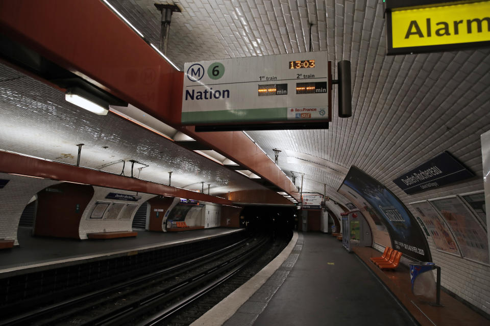 Empty platforms in a closed subway, in Paris, Sunday, Dec. 8, 2019 on the fourth day of nationwide strikes that disrupted weekend travel around France. (AP Photo/Francois Mori)