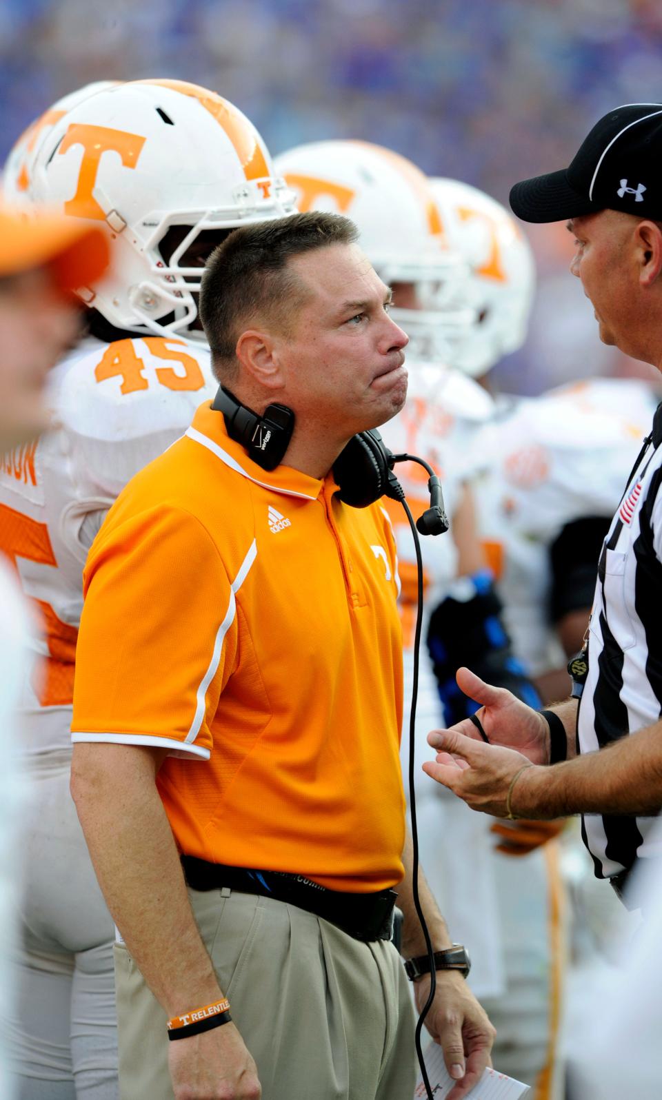 Tennessee head coach Butch Jones listens to the referee explain a call during the second half against Florida Saturday, Sep. 21, 2013 at Ben Hill Griffin Stadium in Gainesville, FL.   (MICHAEL PATRICK/NEWS SENTINEL)