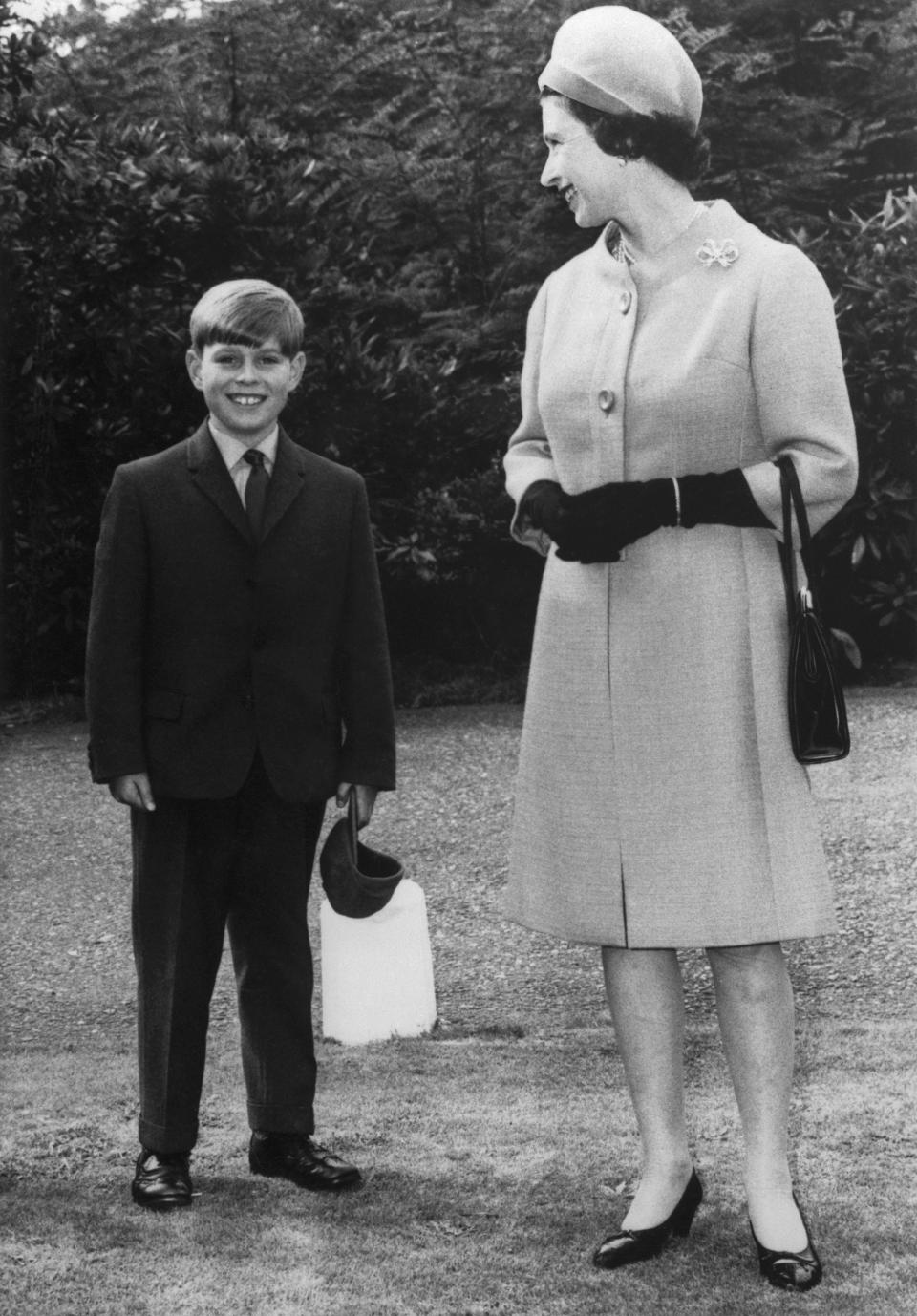 The Queen accompanies Prince Andrew on his first day at Heatherdown Preparatory School in Ascot, England, in 1968. [Photo: Getty]