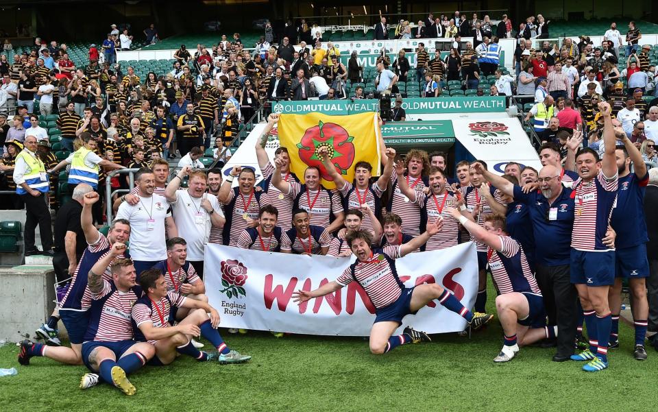 The Lancashire players celebrate after victory during the Bill Beaumonth Division 1 Cup Final between Lancashire and Cornwall at Twickenham Stadium on May 28, 2017 - Credit: Getty