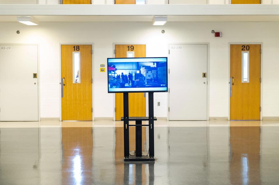 A television plays in the common area of the housing unit A3 ICE pod at the Orange County Jail in Goshen on March 11, 2022.