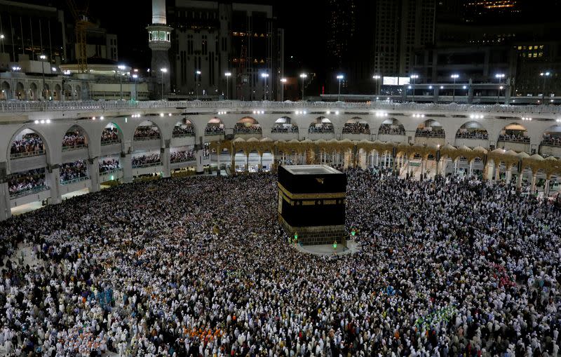 FILE PHOTO: Muslim pilgrims circle the Kaaba and pray at the Grand mosque at the end of their Haj pilgrimage in the holy city of Mecca