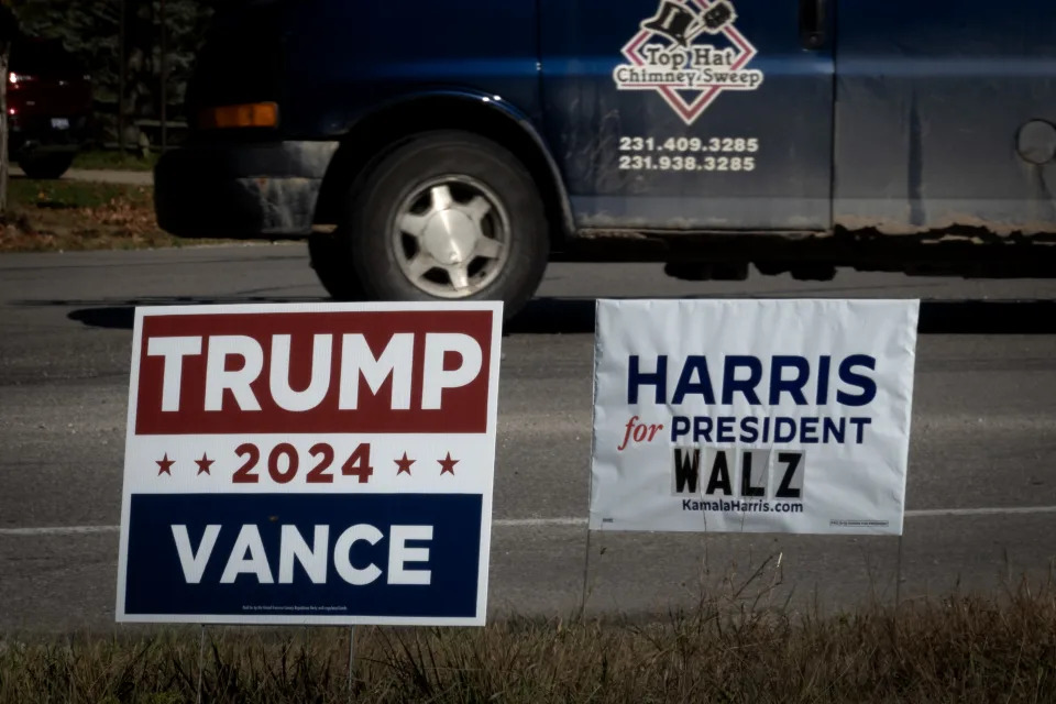 TRAVERSE CITY, MICHIGAN - SEPTEMBER 26: Signs showing support for both Democratic presidential candidate Vice President Kamala Harris and Republican presidential candidate former President Donald Trump sit along a rural highway on September 26, 2024 near Traverse City, Michigan. Michigan is one of the few swing states expected to have the biggest impact on selecting the next U.S. president. (Photo by Scott Olson/Getty Images)