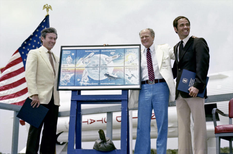 STS-1 astronauts John Young (at left) and Bob Crippen (right) with space artist Robert McCall at the dedication ceremony for the 1981 