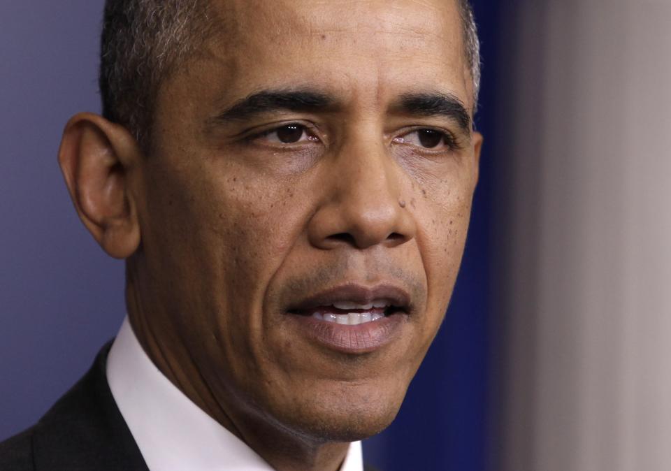 U.S. President Barack Obama speaks to the media in the briefing room of the White House in Washington after the Senate passed the bill to reopen the government October 16, 2013. The U.S. Senate approved a deal on Wednesday to end a political crisis that partially shut down the federal government and brought the world's biggest economy to the edge of a debt default that could have threatened financial calamity. REUTERS/Yuri Gripas (UNITED STATES - Tags: BUSINESS POLITICS HEADSHOT)