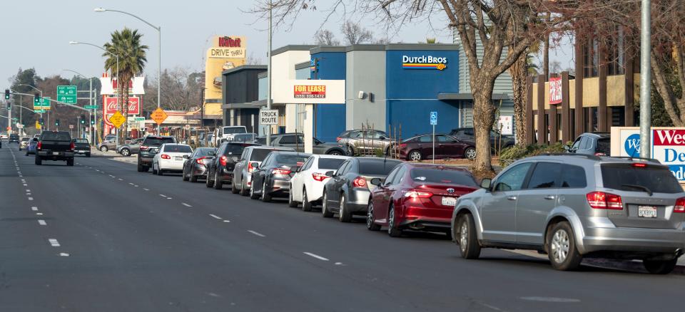 At peak times dozens of cars spill out onto Mooney Blvd waiting for the drive-thru line at the new Dutch Bros. on Mooney Boulevard.