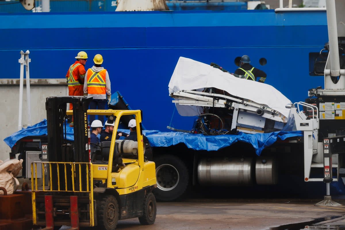 A view of the Horizon Arctic ship, as salvaged pieces of the Titan submersible from OceanGate Expeditions are returned, in St. John’s harbour, Newfoundland, Canada June 28, 2023 (Reuters)