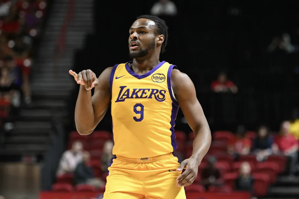 LAS VEGAS, NEVADA - JULY 18: Bronny James Jr. #9 of the Los Angeles Lakers reacts to scoring on the Cleveland Cavaliers in the first half of a 2024 NBA Summer League game at the Thomas & Mack Center on July 18, 2024 in Las Vegas, Nevada. NOTE TO USER: User expressly acknowledges and agrees that, by downloading and or using this photograph, User is consenting to the terms and conditions of the Getty Images License Agreement. (Photo by Candice Ward/Getty Images)