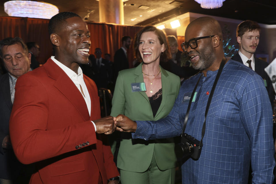 Sterling K. Brown, from left, Nicky Bertham, and Misan Harriman attend the 96th Academy Awards Oscar nominees luncheon on Monday, Feb. 12, 2024, at the Beverly Hilton Hotel in Beverly Hills, Calif. (Photo by Danny Moloshok/Invision/AP)