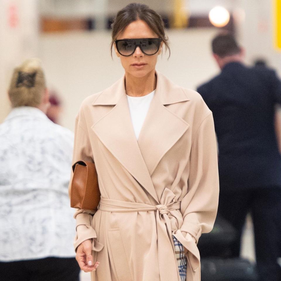 The British designer, Victoria Beckham, reworked her airport uniform for ease and comfort in two pieces.