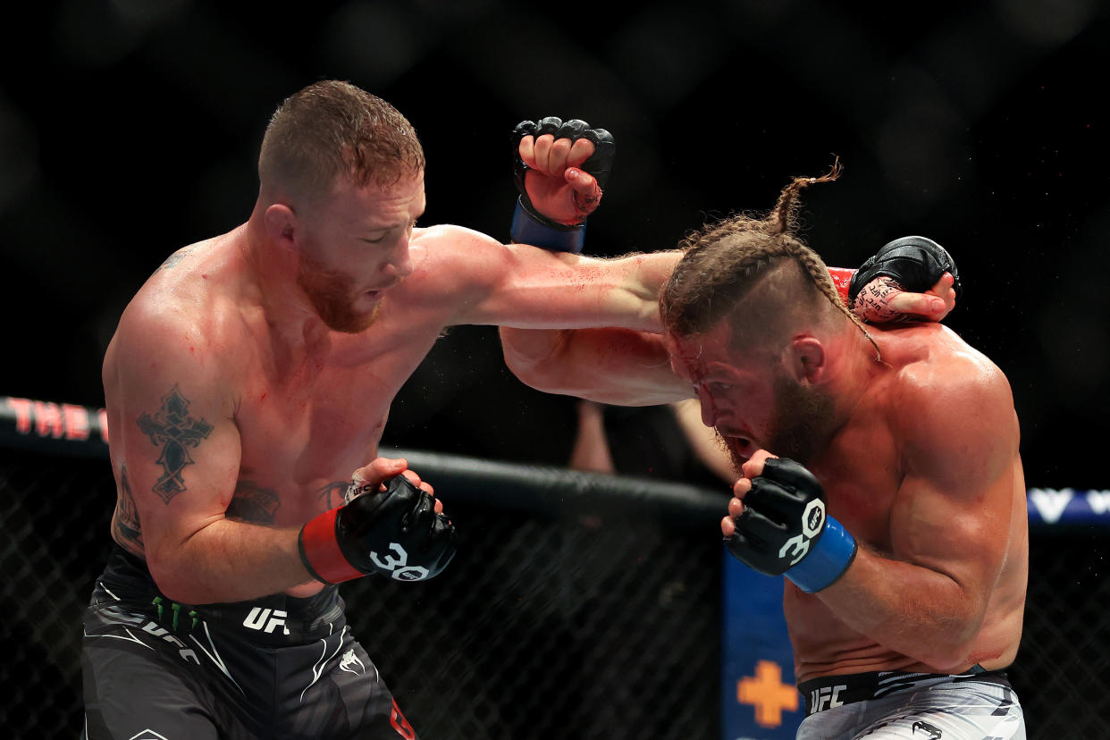 LONDON, ENGLAND - MARCH 18: Justin Gaethje punches Rafael Fiziev during the Lightweight Bout between Justin Gaethje and Rafael Fiziev at The O2 Arena on March 18, 2023 in London, England. (Photo by Catherine Ivill/Getty Images)