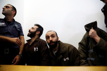 Romain Franck, an employee of the French consulate-general in Jerusalem, appears with co-defendants in the district court in Beersheba, Israel, March 19, 2018. REUTERS/Amir Cohen