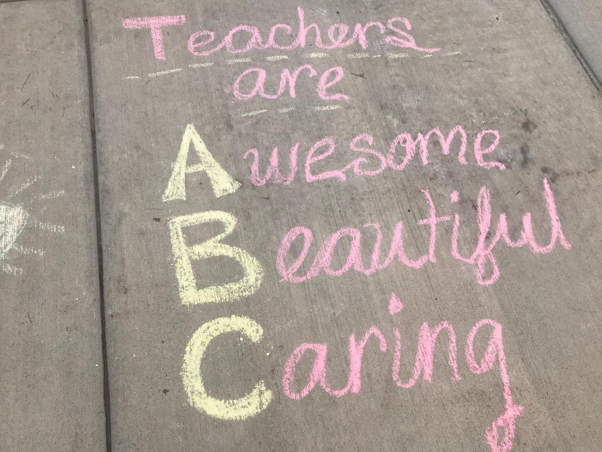 Parents and students at Fremont's Croghan Elementary School showed their support for teachers during National Teacher Appreciation Week with chalk art messages on the pavement outside the school's front door. The school created a series of challenges and fun events for teachers every day as part of the week's events.
