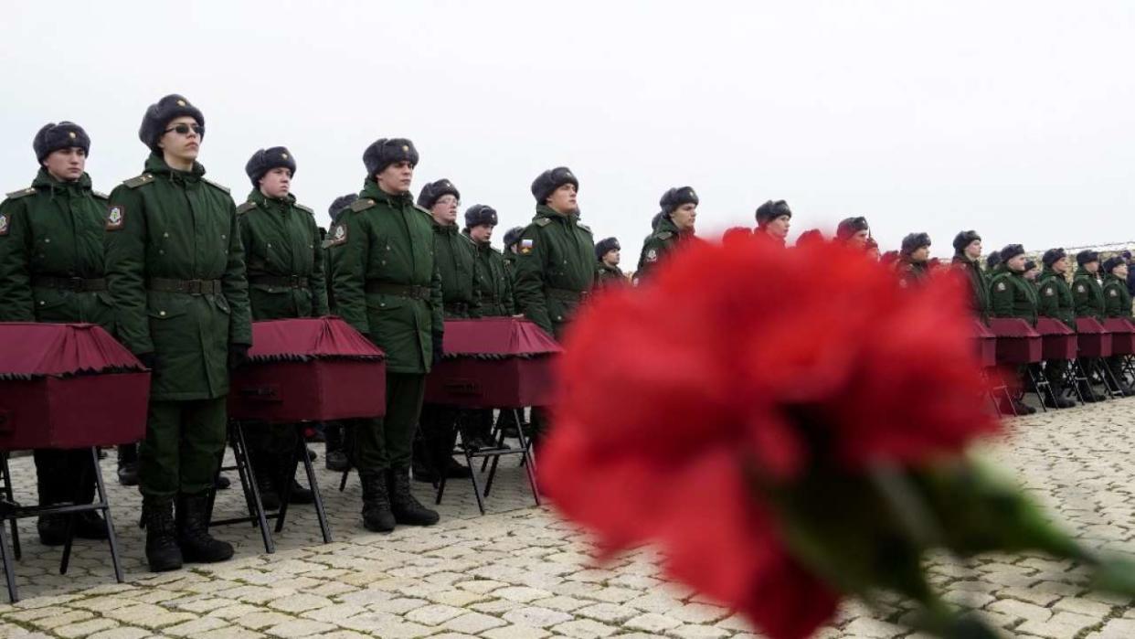 A picture shows a ceremony to rebury the remains of Soviet soldiers killed in the Battle of Stalingrad during World War Two, at a memorial ground in the village of Rossoshka outside the southern city of Volgograd on February 1, 2023. (Photo by STRINGER / AFP)