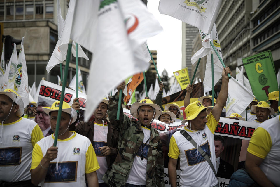 People march during International Labor Day in Bogota, Colombia, Monday, May 1, 2023. (AP Photo/Ivan Valencia)